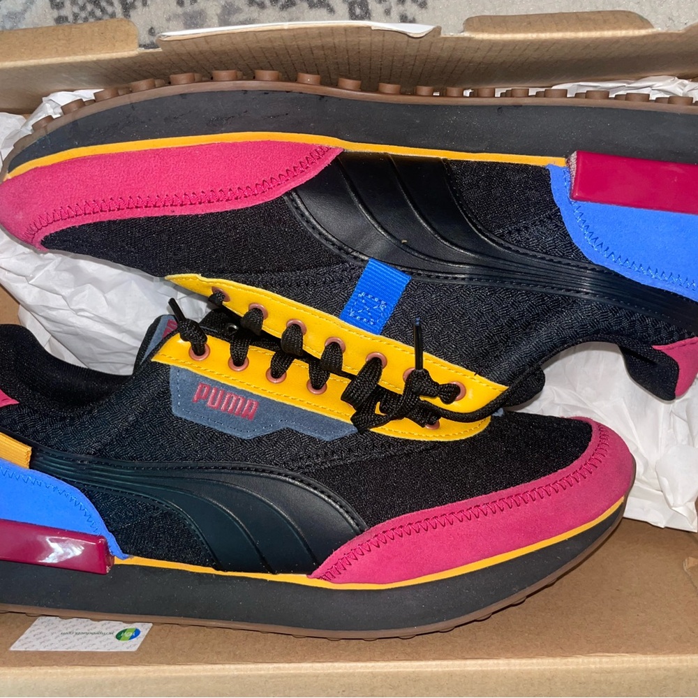 Puma Black Sneakers with Red, Blue, and Yellow Highlights